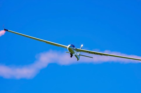 An SZD-59-1 ACRO glider, registration D-1138, during a demonstration as part of an air show at the