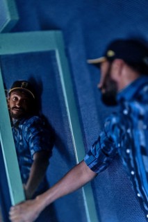 EDITORIAL and NEWS ONLY, celebrity and stand-up comedian Matt Okine looking at himself in mirror