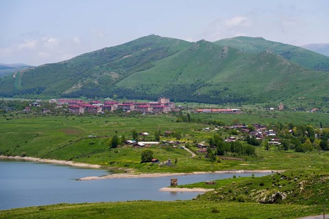 Village in green hills with lake and mountains in the background, Kechut, Kushchi, Kush-Bilyak, and