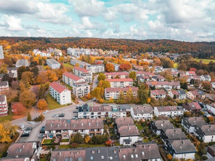 Residential area in autumn colors under bright skies, combining city and nature, Sindelfingen,