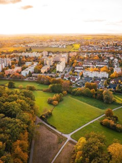 Urban settlement next to forest and green spaces in autumn, Sindelfingen, Böblingen district,