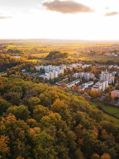 City view with forest in autumn ambiance, Sindelfingen, Böblingen district, Germany