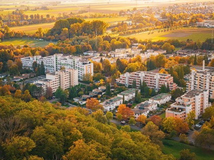 City view with autumn forest and settlements, Sindelfingen, Böblingen district, Germany