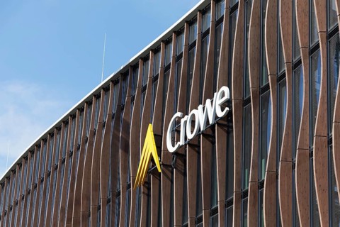 Crowe BPG, audit and consulting firm, logo on modern wooden façade with larch pilasters,
