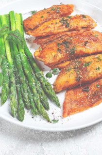 Fried fish fillet, tilapia with asparagus, homemade, no people