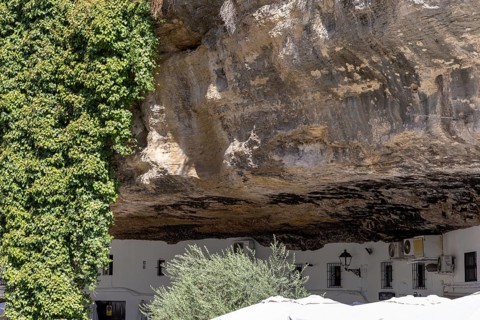 On the road to the white villages. Paths and narrow streets of a historic old town with many white
