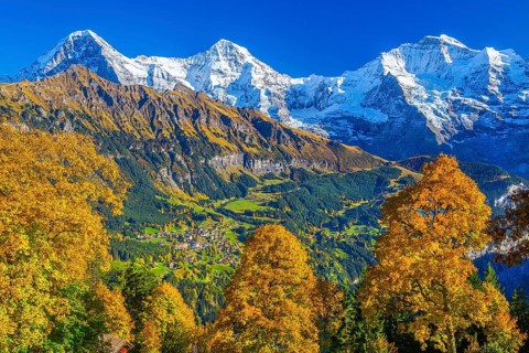 Autumn landscape in the hamlet of Sulwald with views of Wengen and Eiger 3967m, Mönch 4110m and