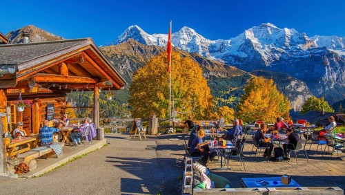 Sun terrace of the mountain inn in the hamlet of Sulwald with Eiger 3967m, Mönch 4110m and Jungfrau