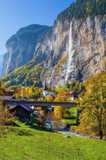 View of town and valley with Staubbach waterfall in autumn, Lauterbrunnen, Bernese Oberland, Canton