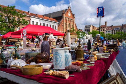 Old vintage things on the street flea market on Place du Jeu de Balle, Marolles district of