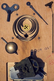 Retro vintage clockwork movement watch mechanism on wood Prague, Czech republic