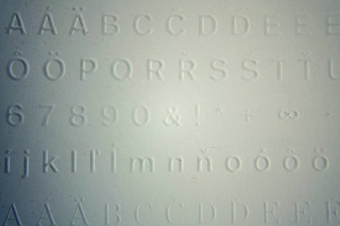 Embossed writing for blind people used before Braille writing system Prague, Czech republic