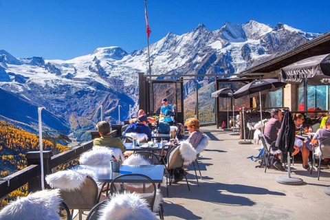 Mountain oyster terrace on Kreuzboden with Alphubel 4206m and Mischabel group 4545m in autumn,