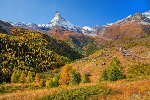 Landscape below the Sunnegga with hamlet of Findeln and Matterhorn 4478 m in autumn, Zermatt,