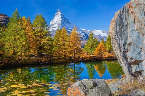 Matterhorn 4478 m above Lake Grindji in autumn, Zermatt, Mattertal, Valais, Switzerland