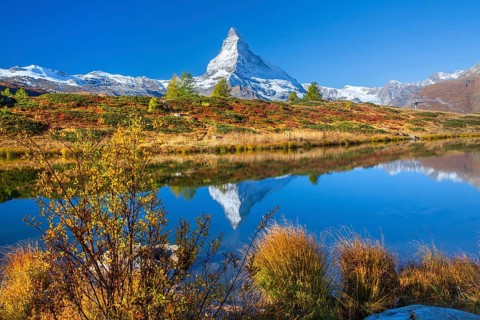 Matterhorn 4478 m with reflection in Leisee on the Sunnegga in autumn, Zermatt, Mattertal, Valais,
