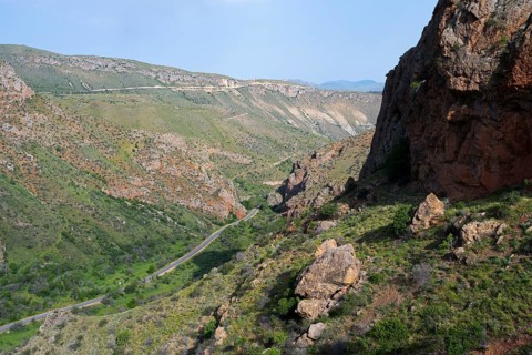 Mountain landscape with road, green hills and rocky gorges, view from Noravank monastery, Noravank,