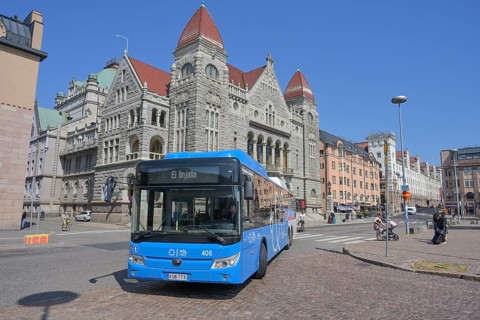 Bus, Rautatientori station square, the Finnish National Theatre in the back, Suomen