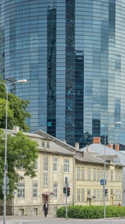Modern office building, high-rise building, small old building, wooden house, Maakri-Kvartal