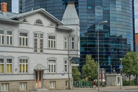 Modern office building, high-rise building, small old building, wooden house, Maakri-Kvartal