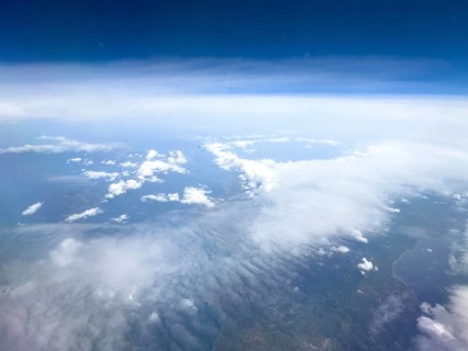 View from airplane of white bright cluster clouds Cirrus cirrus clouds, international