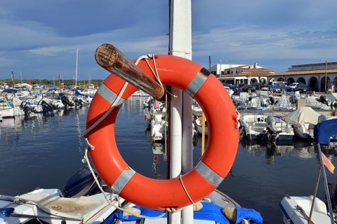 Lifebuoy in the harbor of Colonia Sant Jordi, Majorca, Balearics, Spain