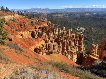 Majestic red rock formations stretch across the valley with breathtaking views, Bryce Canyon
