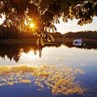 Atmospheric sunset over Lake Grienerick, Rheinsberg, Brandenburg, Germany