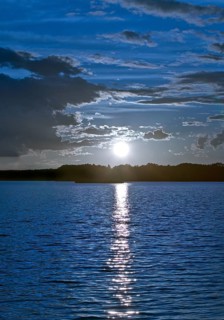 Atmospheric moonrise over Lake Gudelack, Lindow (Mark), Stechlin-Ruppiner Land nature park Park,