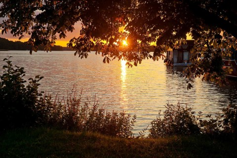 Atmospheric sunset over Lake Gudelack, Lindow (Mark), Stechlin-Ruppiner Land nature park Park,