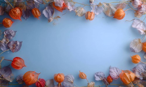 A blue background with a frame of orange and purple flowers. The flowers are arranged in a way that