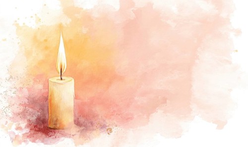 A candle is lit on a table with a pink background. The candle is the main focus of the image, and
