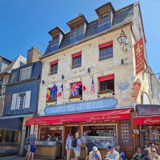 Honfleur, Normandy, France, May 30, 2025: La Maison Bleue a charming brasserie and creperie in the