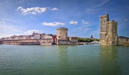 Panoramic view of the iconic entrance to the Vieux Port of La Rochelle, France. Panorama of all