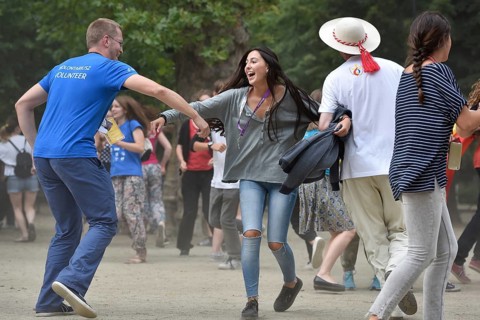WROCLAW, POLAND - JULY 24, 2016: Dancing pilgrims of the World Youth Day during open concert Mercy
