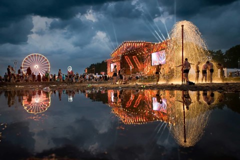 KOSTRZYN NAD ODRA, POLAND - AUGUST 3, 2017: Festival Przystanek Woodstock - fans bath in the mud in