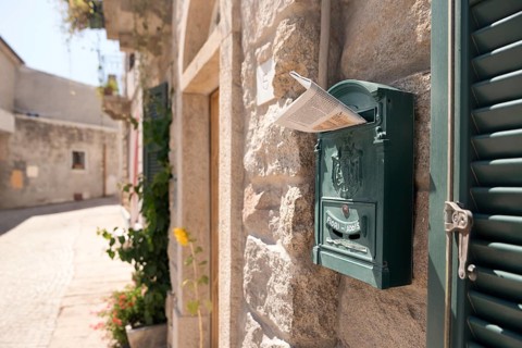 Mailbox. Purple home mailbox. Pink mailbox on Rovinj street, Croatia. Mediterranean style pink