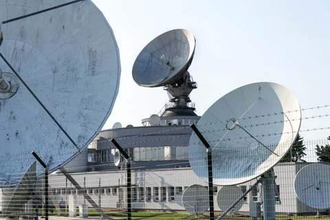 Radar antenna on satellite links center, telecommunication tower, wireless communication concept,