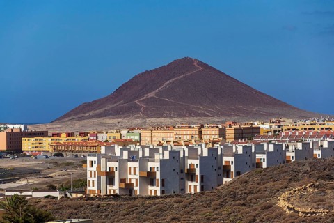 Montana Roja mountain on Tenerife coast near El Medano, Canary Islands, Spain, sunny summer day
