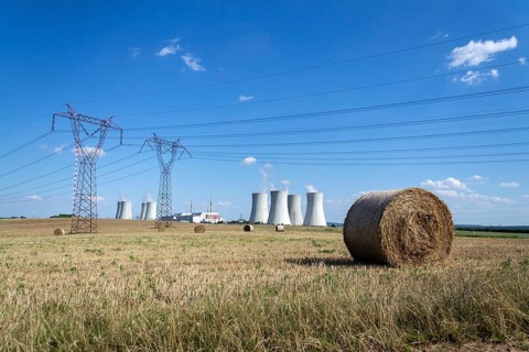 Cooling towers at nuclear power plant, energy self-sufficiency, greenhouse emission reduction and