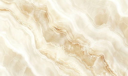 A large, white stone wall with a pattern of waves and swirls. The stone is likely made of marble,