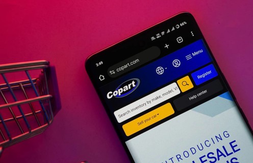 Dhaka, Bangladesh- 23 June 2025: A smartphone displaying the Copart website with a shopping cart is