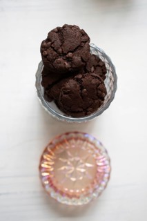 Chocolate chip cookies in a glass cookie jar