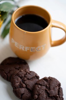 Chocolate chip cookies with a cup of black coffee