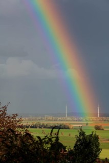Rainbow over the Calenberger Land between Hanover and Hildesheim, wind turbines seen from the