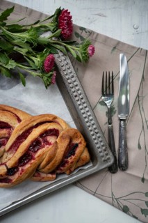 Marmalade strudel on an antique baking tray