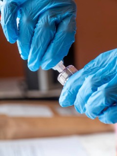 Istambul, Turkey October 21st 2025 Nurse hands in blue gloves preparing Sandostatin Anti growth