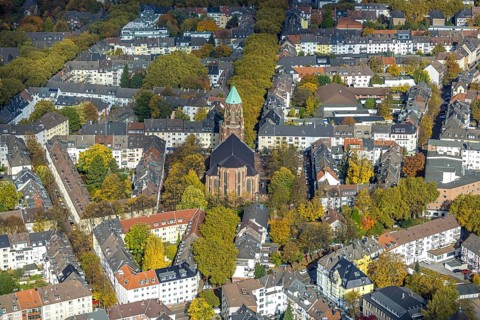 Aerial view, residential area with Catholic Church of St. Mary's Conception, autumn trees,