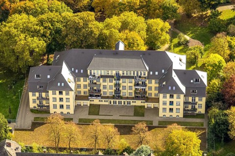 Aerial view, Bärendelle housing development with autumn trees, former school building, Frohnhausen,