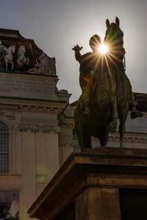 Sunbeams over the equestrian statue of Emperor Joseph II, Josefsplatz, Vienna, Austria